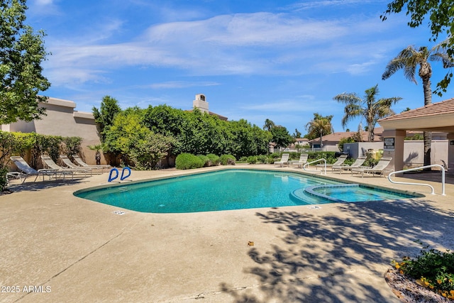 pool with a patio area