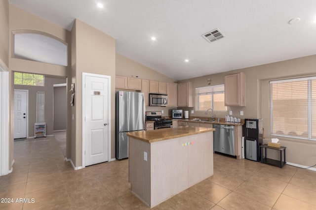 745 E Megan St, Chandler, AZ 85225 - kitchen featuring visible vents, appliances with stainless steel finishes, a sink, a center island, and light brown cabinetry