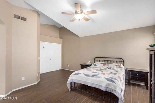 bedroom featuring a closet, lofted ceiling, ceiling fan, and hardwood / wood-style floors