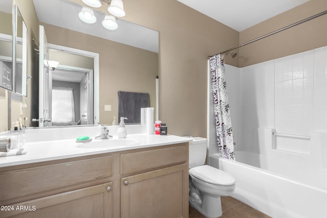 full bathroom with shower / bath combo with shower curtain, vanity, tile patterned flooring, and toilet