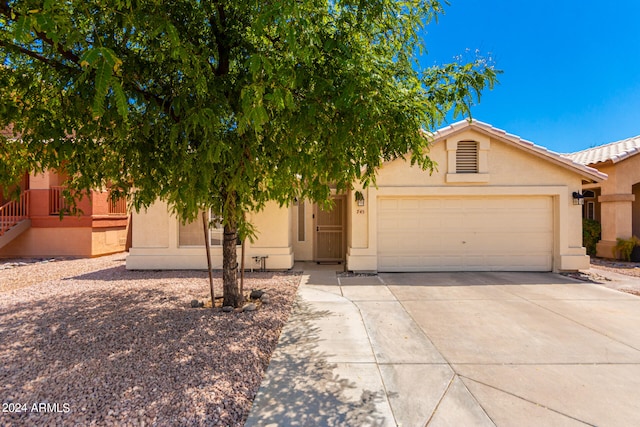 view of front of property with a garage