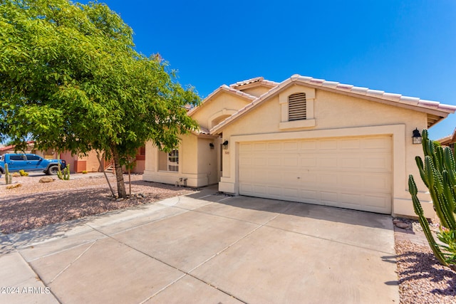 view of front of home with a garage