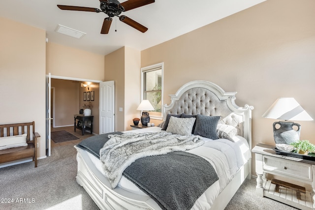 bedroom featuring dark carpet and ceiling fan