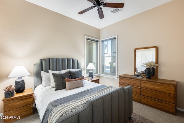 carpeted bedroom with ceiling fan