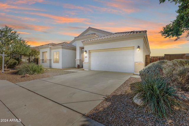 view of front of property with a garage