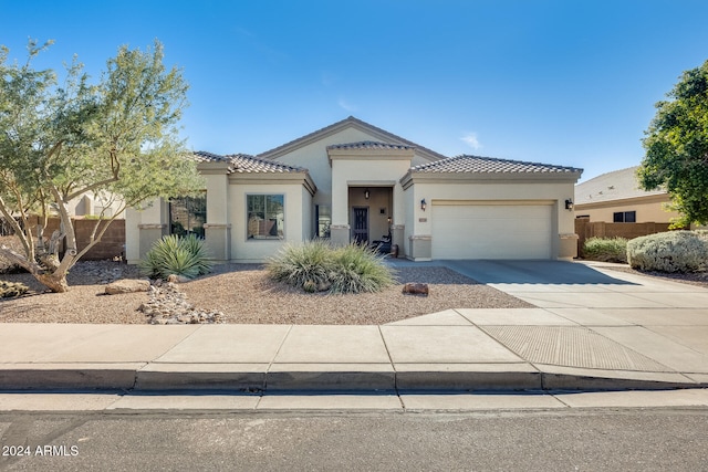 view of front of home with a garage