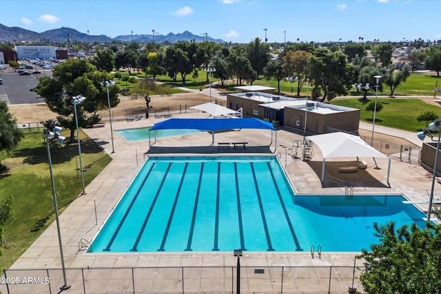 11621 N 39th Dr, Phoenix, AZ 85029 - community pool with a patio area, a mountain view, and fence
