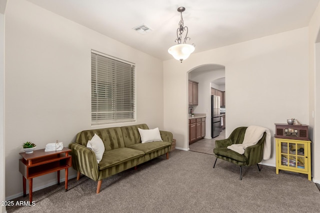 living room with light carpet