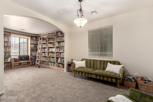 sitting room featuring carpet floors