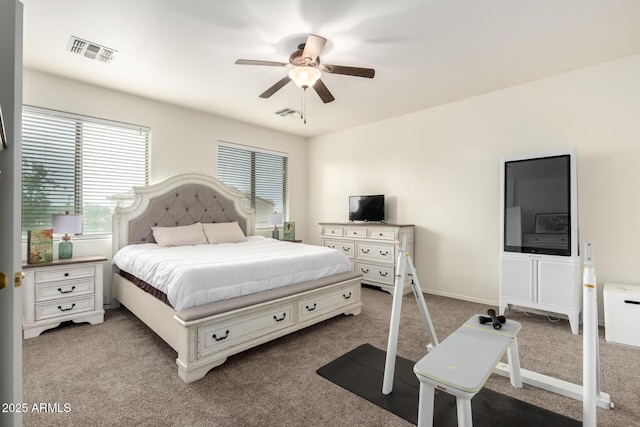 bedroom with light carpet and ceiling fan