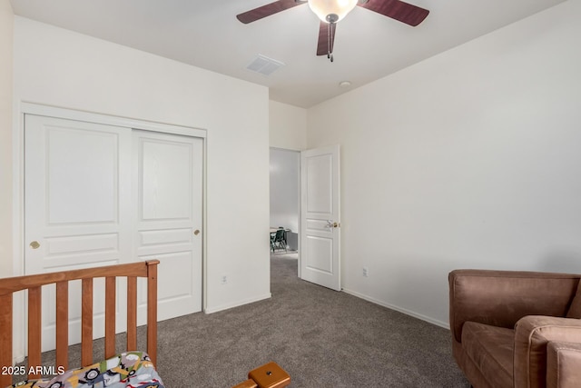 28282 N Castle Rock Dr, San Tan Valley, AZ 85143 - bedroom with ceiling fan, dark colored carpet, and a closet