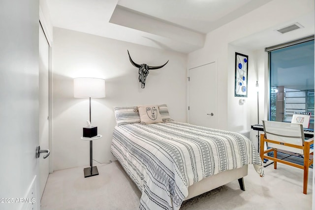 bedroom featuring visible vents