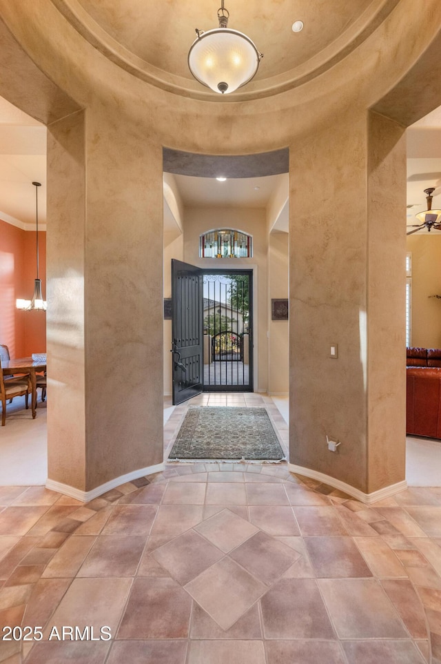 entrance foyer with a towering ceiling