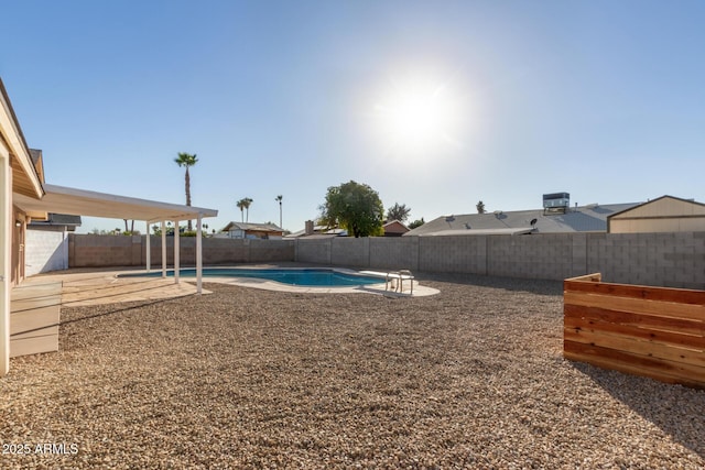 14408 N 35th Ave, Phoenix, AZ 85053 - view of yard featuring a fenced in pool and a patio area