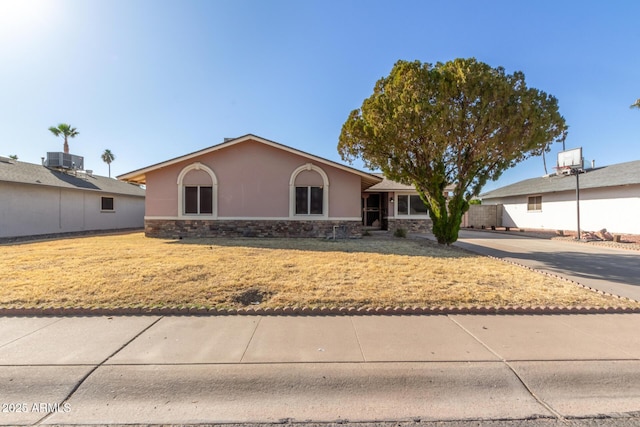 14408 N 35th Ave, Phoenix, AZ 85053 - ranch-style house with central AC unit and a front yard