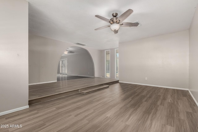 14408 N 35th Ave, Phoenix, AZ 85053 - unfurnished living room with wood-type flooring and ceiling fan