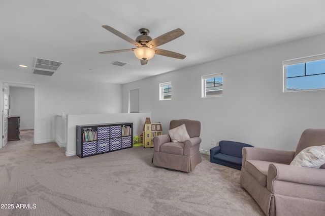 12370 W Cassia Trl, Peoria, AZ 85383 - living area with carpet flooring, healthy amount of natural light, a ceiling fan, and recessed lighting