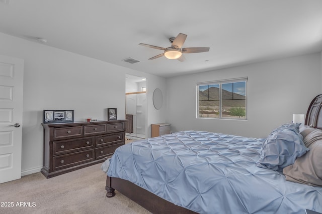 12370 W Cassia Trl, Peoria, AZ 85383 - bedroom with light colored carpet, ceiling fan, and baseboards