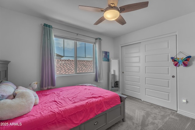 12370 W Cassia Trl, Peoria, AZ 85383 - carpeted bedroom with a closet and a ceiling fan