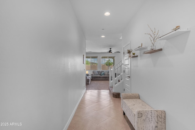 12370 W Cassia Trl, Peoria, AZ 85383 - corridor featuring recessed lighting, light tile patterned flooring, baseboards, and stairs