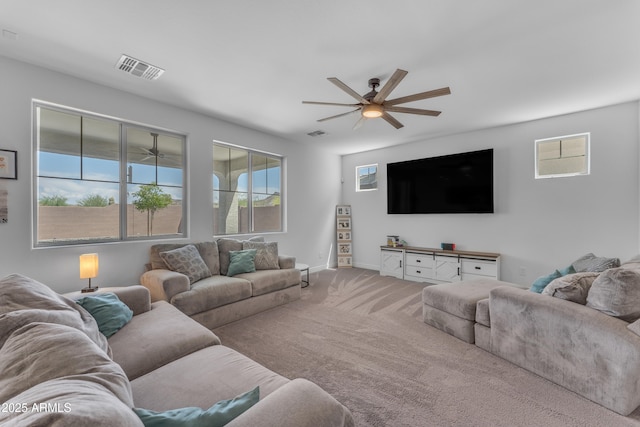 12370 W Cassia Trl, Peoria, AZ 85383 - carpeted living area featuring a ceiling fan, healthy amount of natural light, and baseboards
