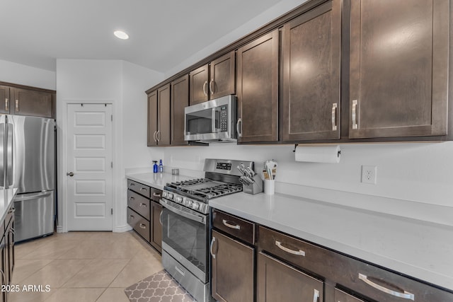 12370 W Cassia Trl, Peoria, AZ 85383 - kitchen featuring appliances with stainless steel finishes, dark brown cabinetry, light countertops, and recessed lighting