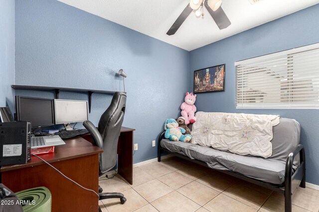 office area with baseboards, visible vents, a ceiling fan, tile patterned flooring, and a textured ceiling