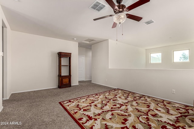 spare room with carpet flooring and ceiling fan