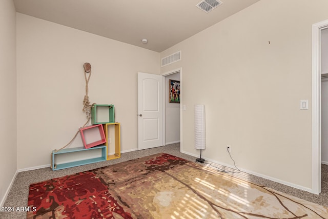 unfurnished room with carpet floors