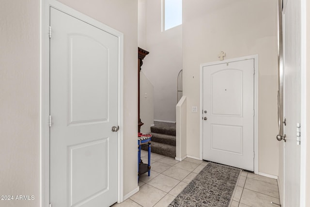 view of tiled foyer entrance