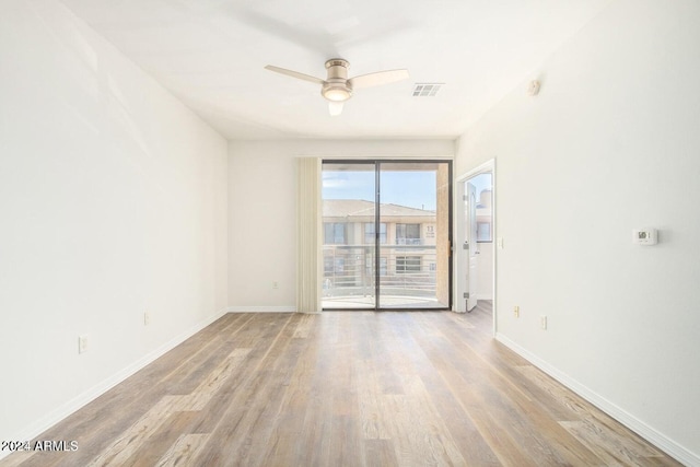 unfurnished room with ceiling fan and light hardwood / wood-style floors