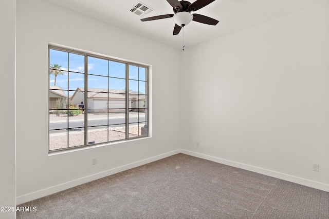 81 E Smoke Tree Rd, Gilbert, AZ 85296 - carpeted spare room with a ceiling fan and baseboards