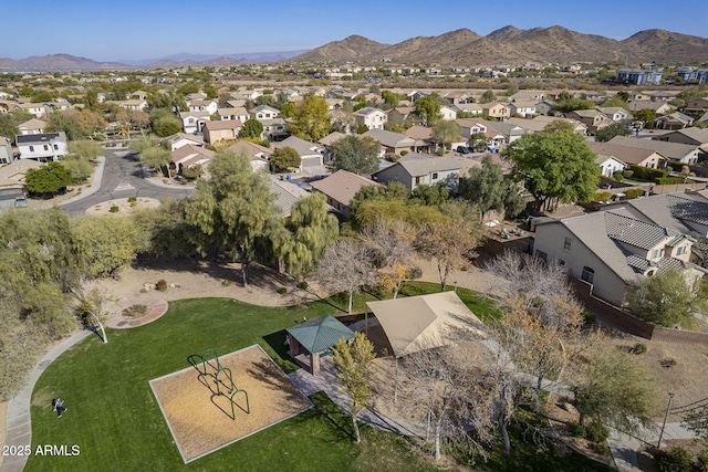 drone / aerial view featuring a mountain view