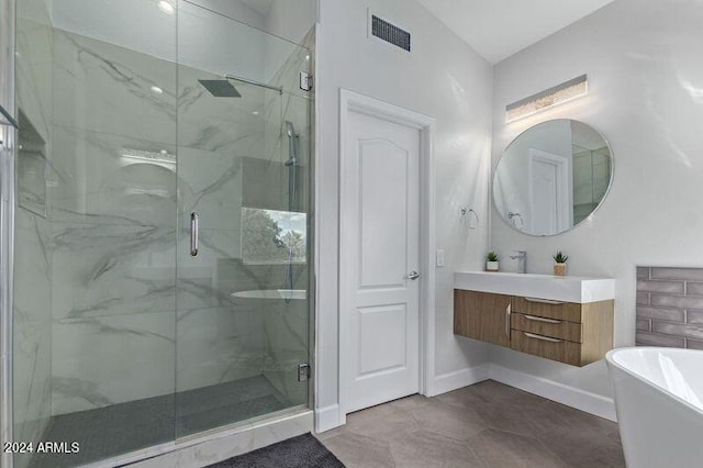 6449 E Paradise Ln, Scottsdale, AZ 85254 - full bathroom featuring a freestanding bath, a marble finish shower, vanity, and baseboards