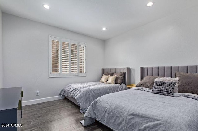 6449 E Paradise Ln, Scottsdale, AZ 85254 - bedroom with wood finished floors, recessed lighting, and baseboards
