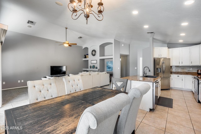 7435 W Trails Dr, Glendale, AZ 85308 - dining area featuring vaulted ceiling, built in shelves, light tile patterned flooring, a ceiling fan, and recessed lighting