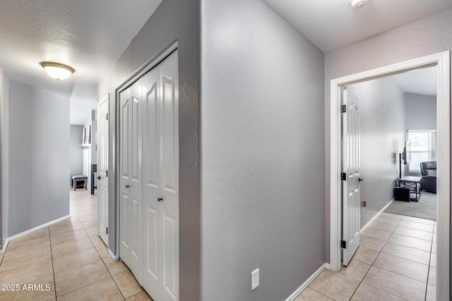 7435 W Trails Dr, Glendale, AZ 85308 - corridor featuring light tile patterned floors