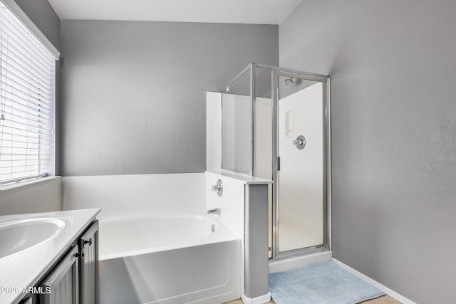 7435 W Trails Dr, Glendale, AZ 85308 - full bathroom with a shower stall, plenty of natural light, a garden tub, and vanity