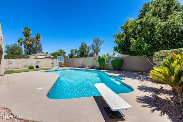 7435 W Trails Dr, Glendale, AZ 85308 - view of pool with a diving board, a fenced backyard, and a patio area