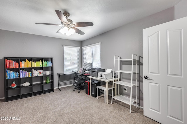 7435 W Trails Dr, Glendale, AZ 85308 - carpeted home office with a ceiling fan and baseboards