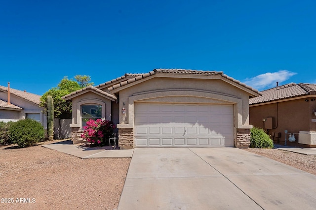 8660 E Nido Ave, Mesa, AZ 85209 - view of front facade featuring stone siding, concrete driveway, an attached garage, and stucco siding