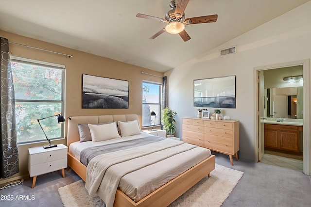 8660 E Nido Ave, Mesa, AZ 85209 - bedroom featuring light colored carpet, lofted ceiling, connected bathroom, and a ceiling fan