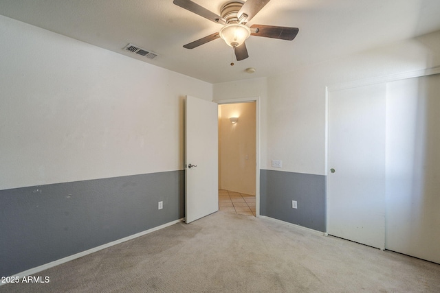 8660 E Nido Ave, Mesa, AZ 85209 - unfurnished bedroom featuring carpet floors, ceiling fan, and a closet