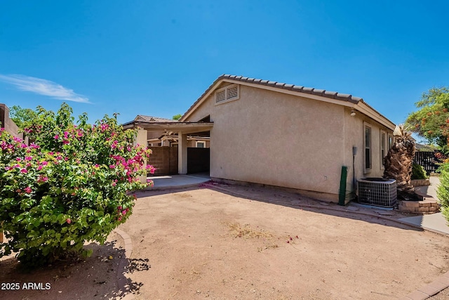 8660 E Nido Ave, Mesa, AZ 85209 - view of home's exterior featuring a patio area and stucco siding