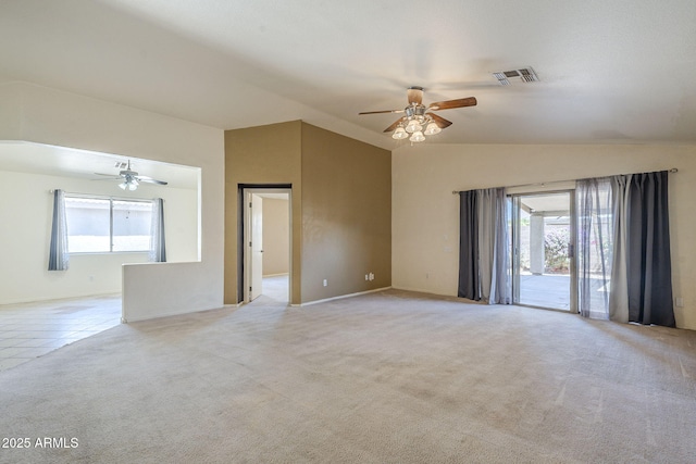 8660 E Nido Ave, Mesa, AZ 85209 - empty room featuring ceiling fan, healthy amount of natural light, vaulted ceiling, and carpet flooring