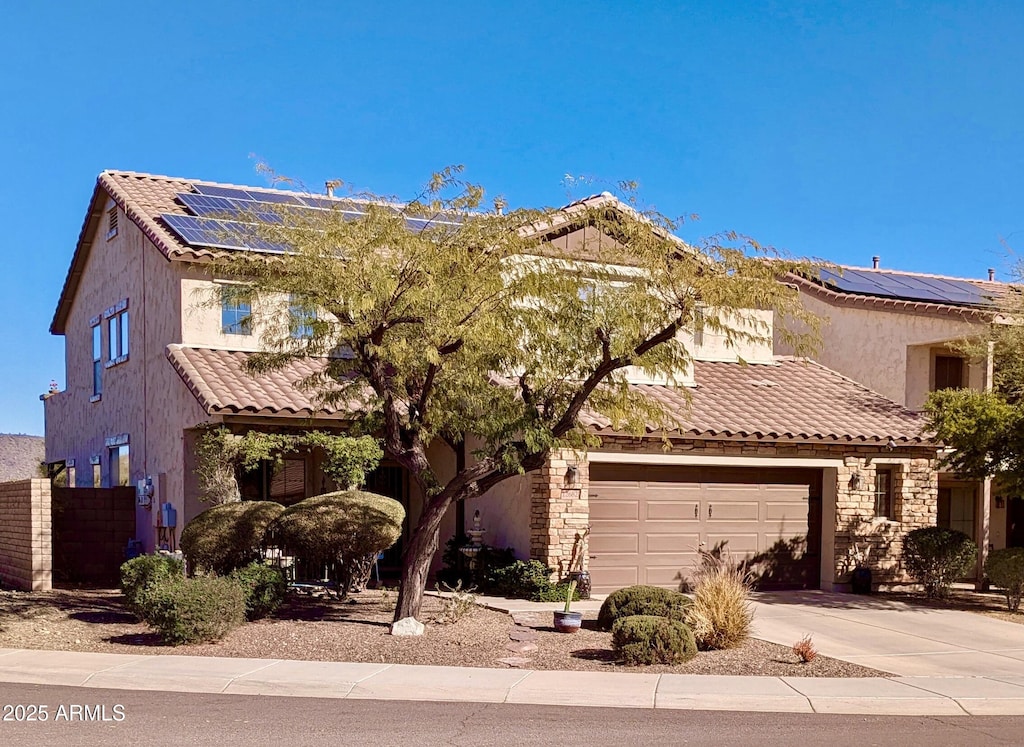 view of front of house with solar panels