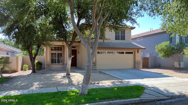 view of front of property with a garage