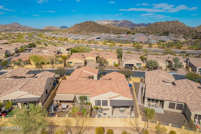 aerial view with a mountain view and a residential view