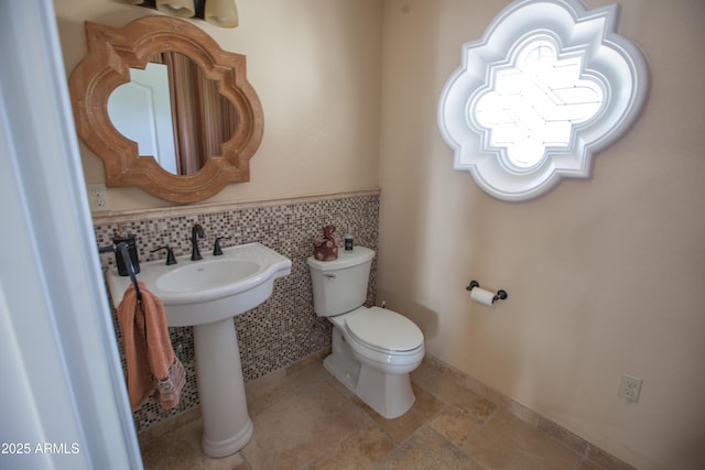 bathroom with toilet and sink