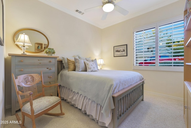 bedroom featuring ceiling fan, light colored carpet, and ornamental molding